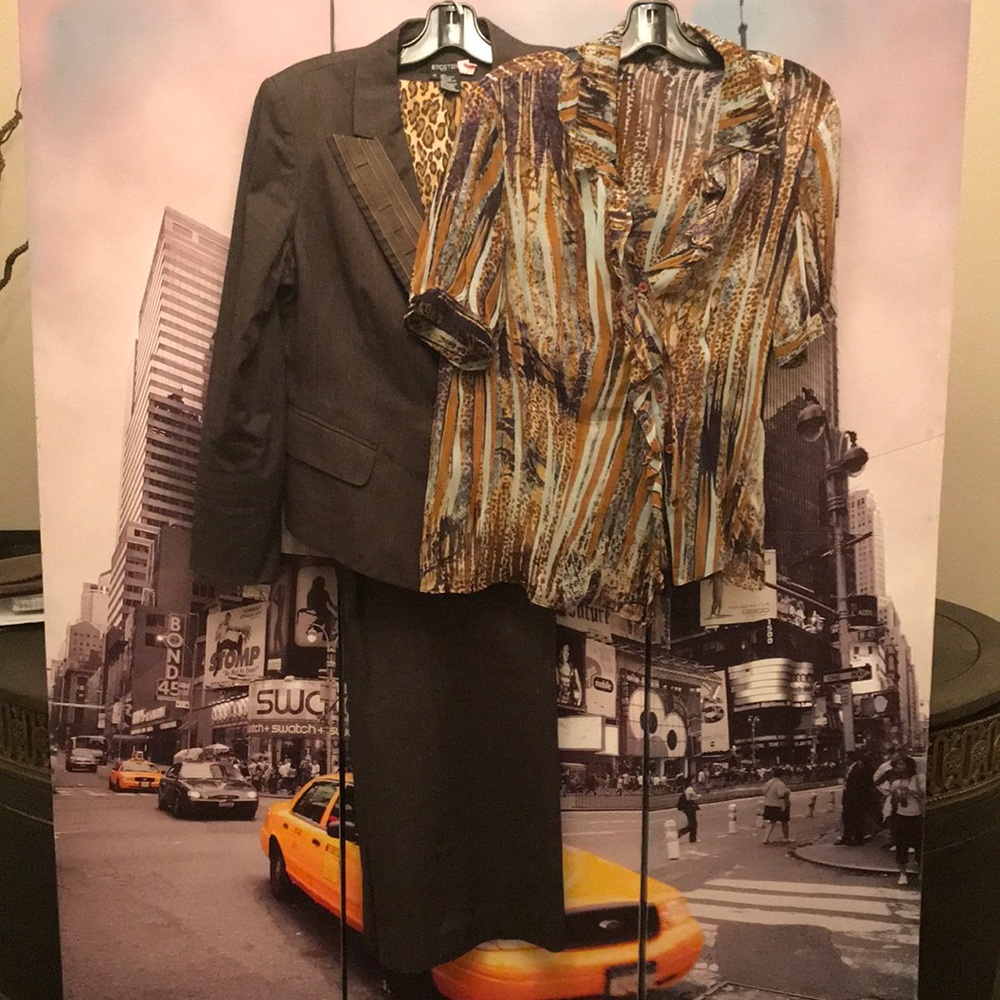 Pantsuit.  This listing includes 4 pieces.